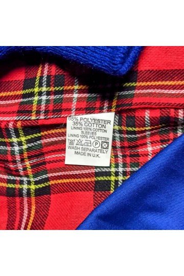 veste harrington bleu royal , étiquette de composition . Made in UK