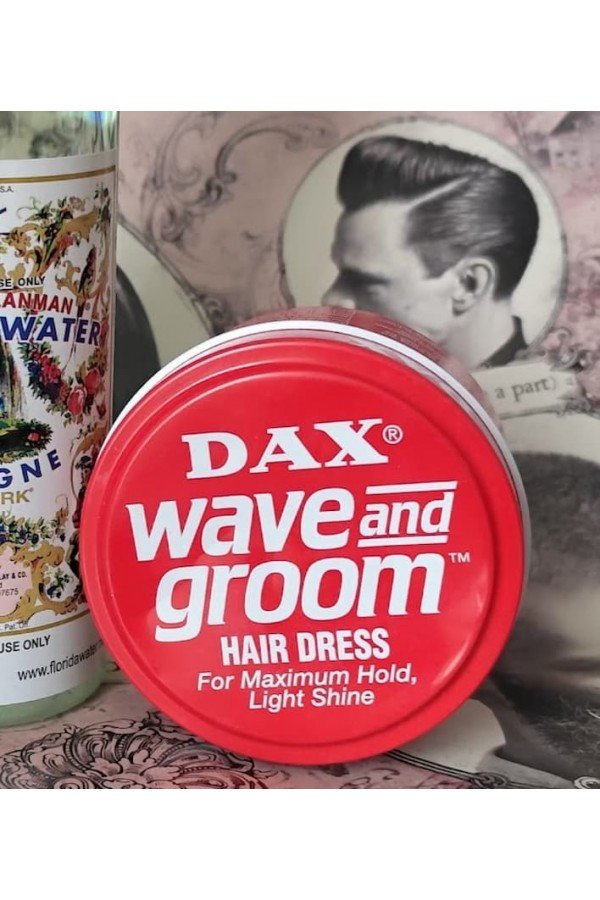 Gomina Dax rouge. Pot 99g. Fabriqué aux USA. Complète le rasage traditionnel.
