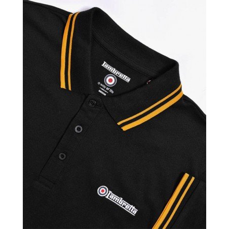 Polo Lambretta Clothing. Noir bandes jaunes. Détails du col , bas des manches et du logo lambretta sur la poitrine.